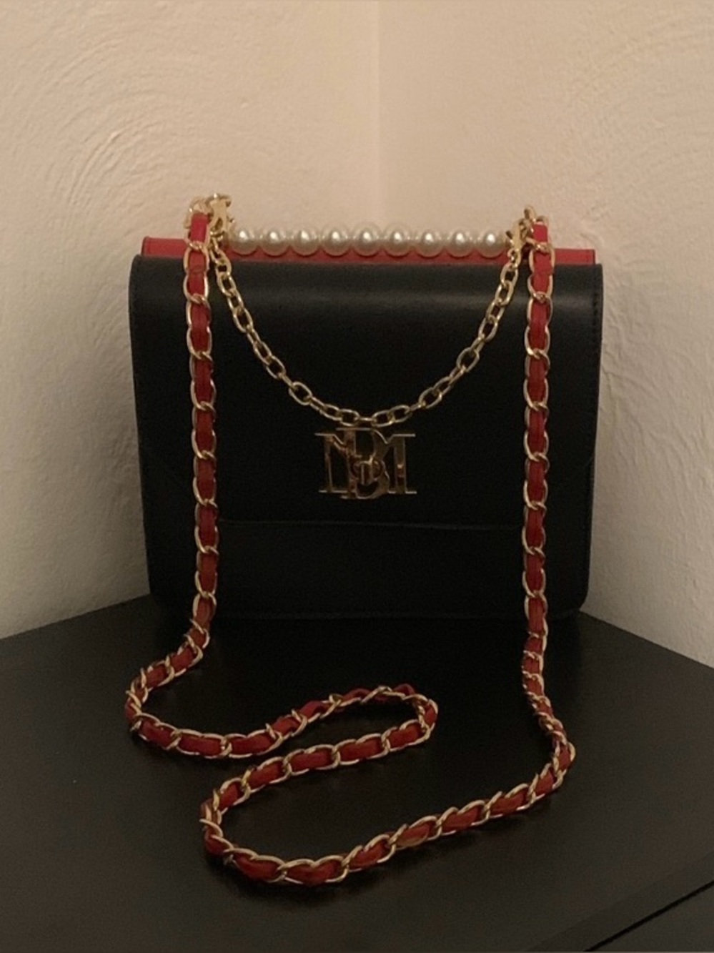 Badgley Mischka Black Crossbody with Red-Trim Chain and Pearl Top